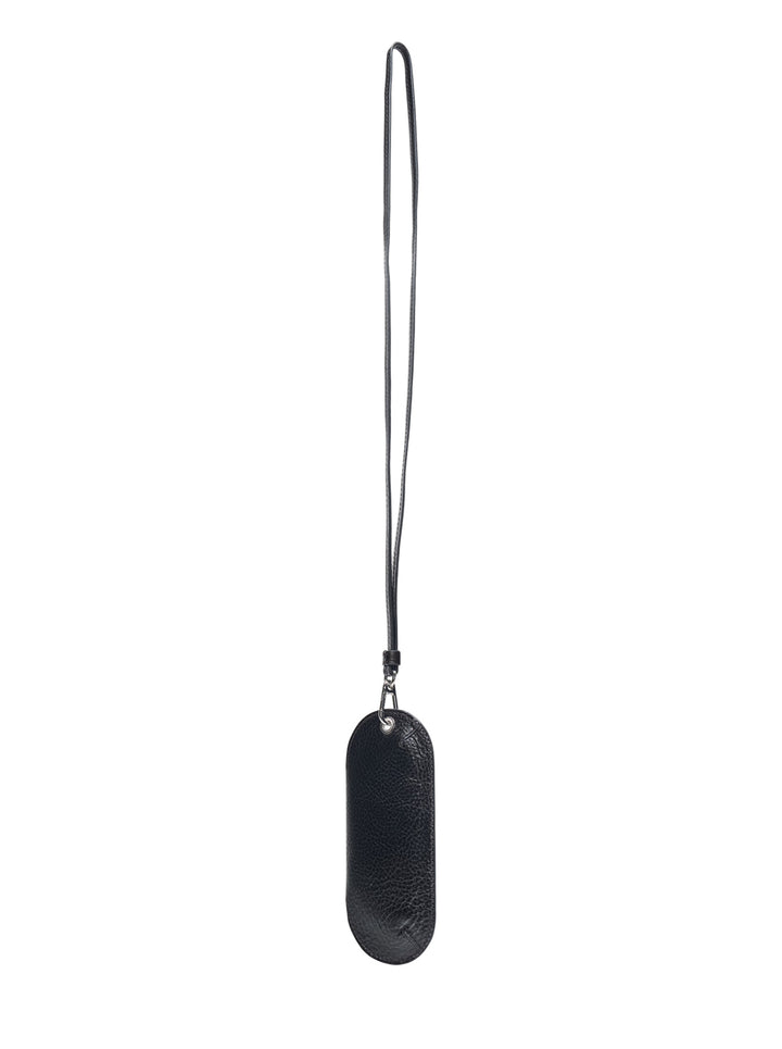 Lemaire Bell Glasses Holder in black pebbled leather with an oval silhouette, snap-fastened front pocket, and long leather lanyard with silver-tone clip - view 2