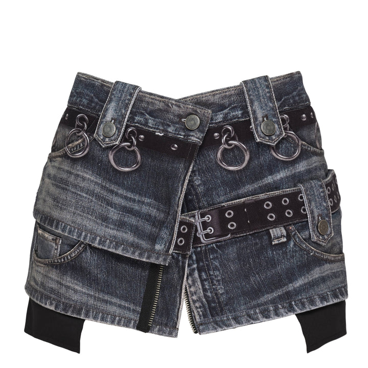 Andersson Bell Asymmetric Layered Wrap Skirt in washed indigo denim with studded belt straps, silver O-ring hardware, exposed zip, and contrast black layered hem