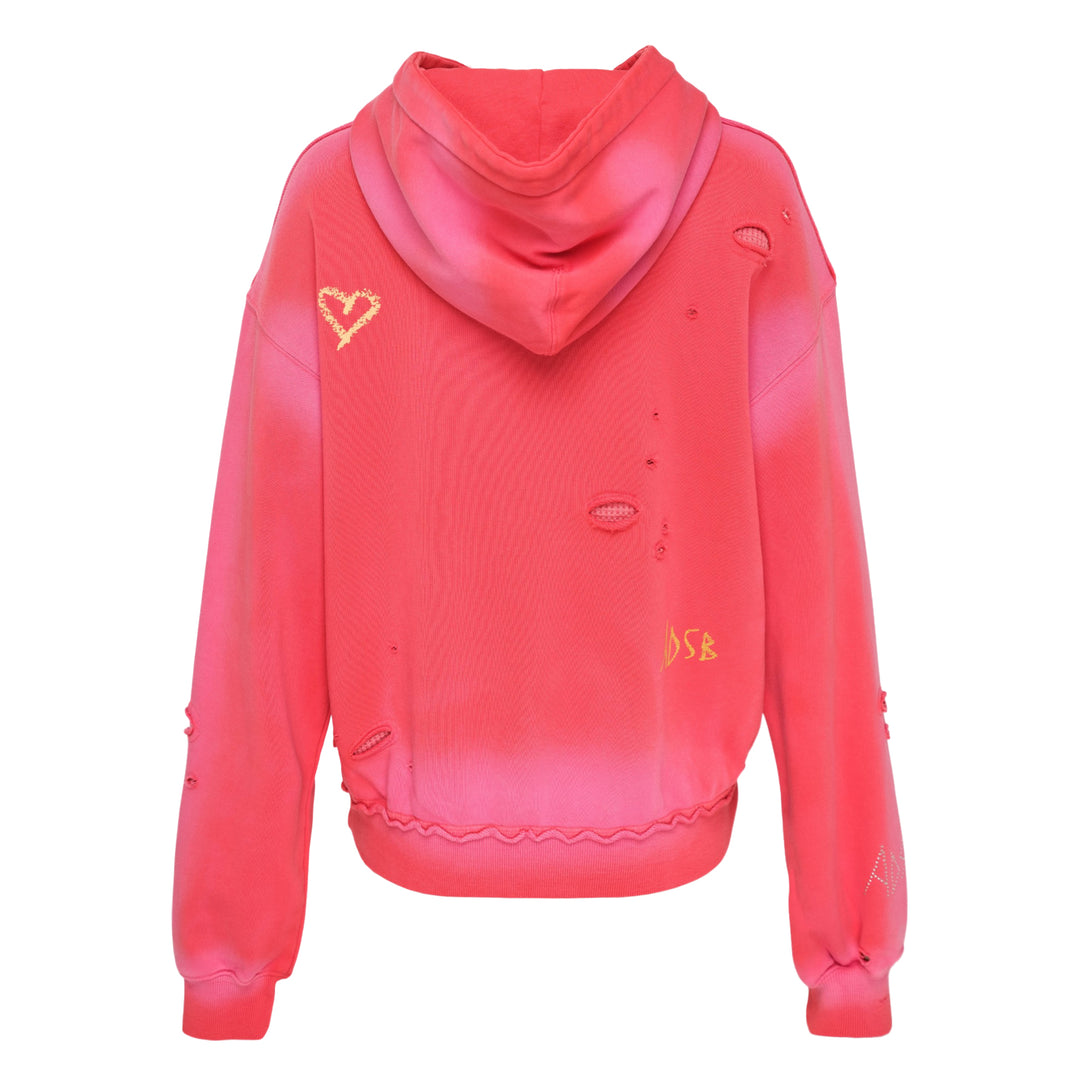 Andersson Bell unisex spray washed distressed hoodie in red with gold 'Again?' script graphic, lip-print motif, intentional slub holes, and raw-edge hem detailing — flat lay front view