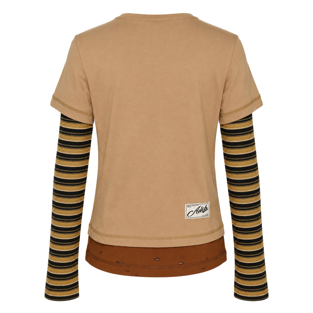 Andersson Bell Layered Heart Message Long Sleeve Tee in khaki with striped knit sleeves and a hand-painted-style pink heart graphic reading 'Coincidence more like destiny's pre-game' on the chest, with distressed hem detailing