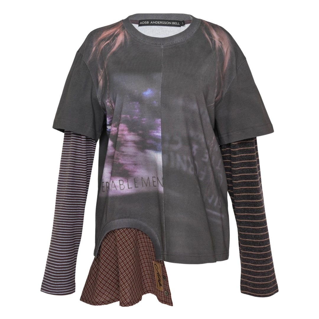 Andersson Bell Mixed Stripe Sleeve Layered Tee with photographic grey print, striped long-sleeve underlayer, and asymmetric plaid hem panel with woven script label