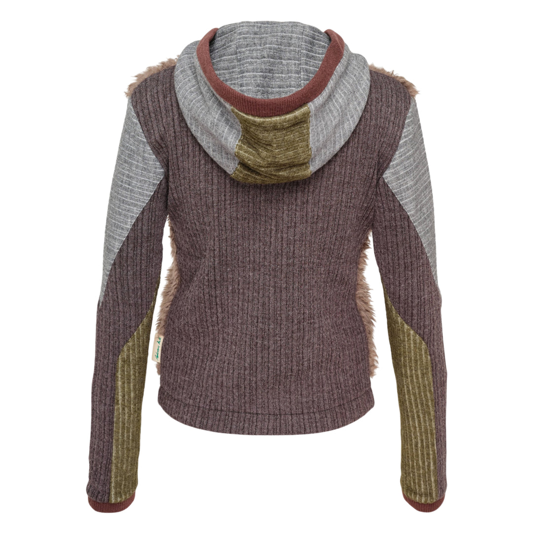 Andersson Bell faux fur color-blocked hooded zip-up sweater with taupe fur front panel, patchwork ribbed knit sleeves in grey charcoal and olive, striped hood with burgundy trim, and full-length zip closure — flat lay on white background