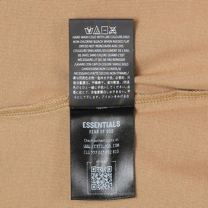 Fear of God Essentials Women's Classic Fit Tee in khaki, flat-lay front view showing crewneck collar and short sleeves