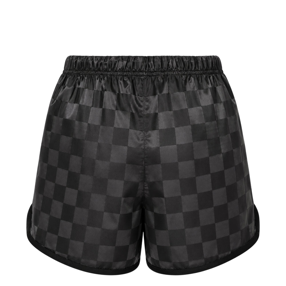 Fear of God Essentials Checkered Gym Shorts in all-over tonal black checkerboard jacquard with elasticated drawstring waistband and hem cord adjusters, laid flat