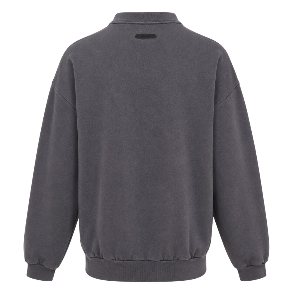 Fear of God Essentials Greek Letter 90s Sweatshirt in washed charcoal, featuring oversized drop-shoulder silhouette, tonal ΦΩΓ appliqué lettering across the chest, and a front kangaroo pocket