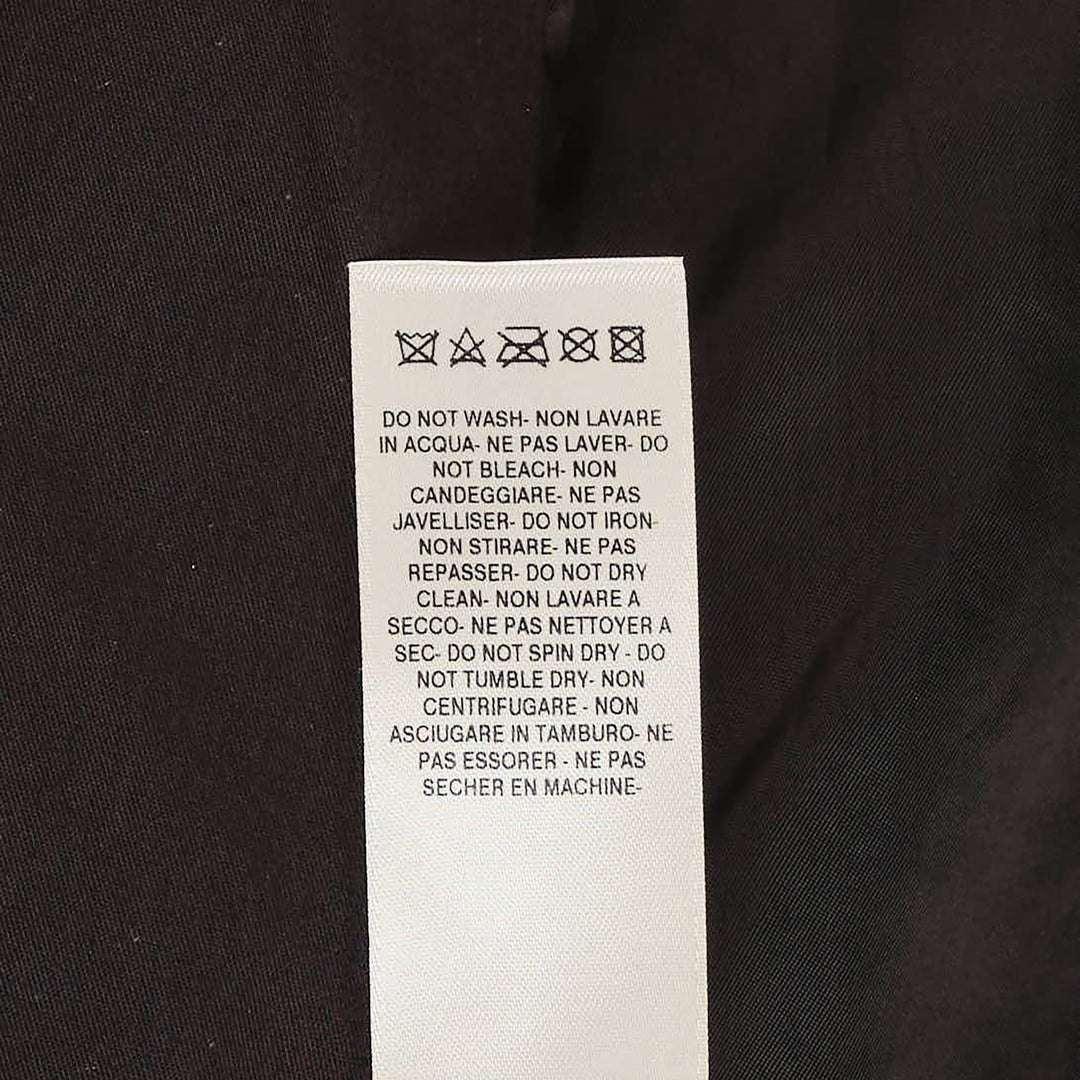 Rick Owens sleeveless black grained leather shirt with oversized draped collar, hidden front placket, and two patch pockets in a longline silhouette - view 3