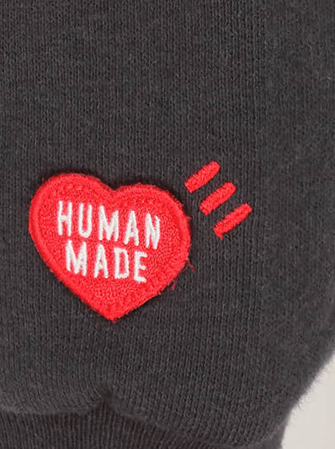 Human Made Embroidered Crewneck Sweatshirt in washed black with multicolour chain-stitch logo lettering across the chest and a heart logo patch on the cuff - view 3