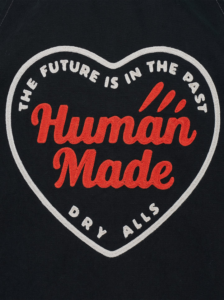 Human Made black zip-up work jacket with corduroy collar, brass two-way zip and embroidered red and white heart logo patch on the chest - view 3