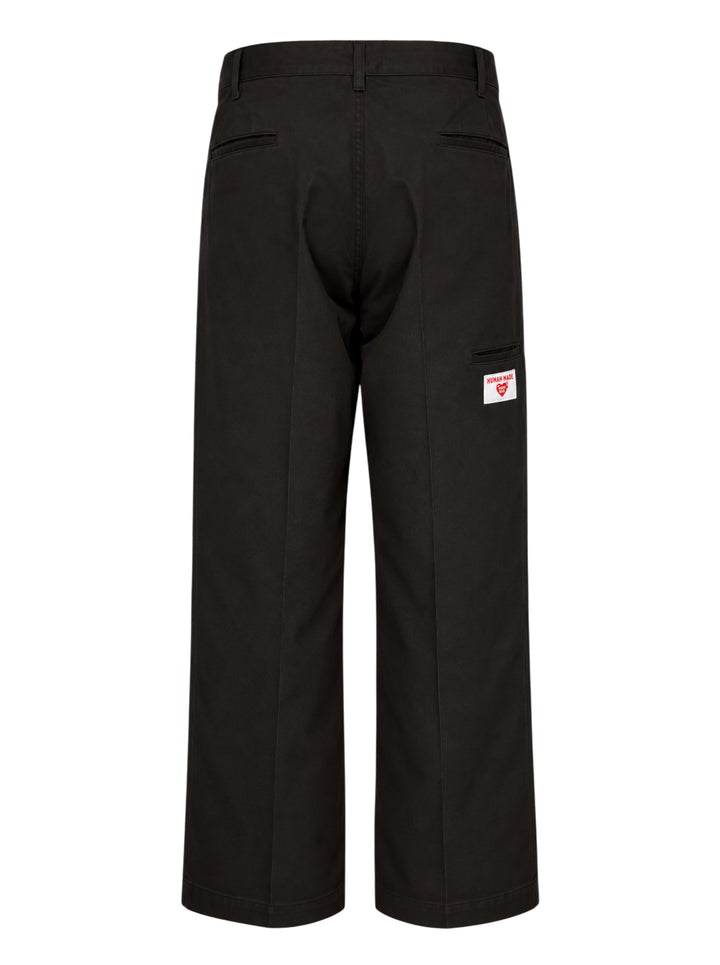 Human Made Skater Wide Leg Pants in black, featuring a high-rise waistband, double front pleats, and a relaxed wide-leg silhouette with stitched crease detail - view 2