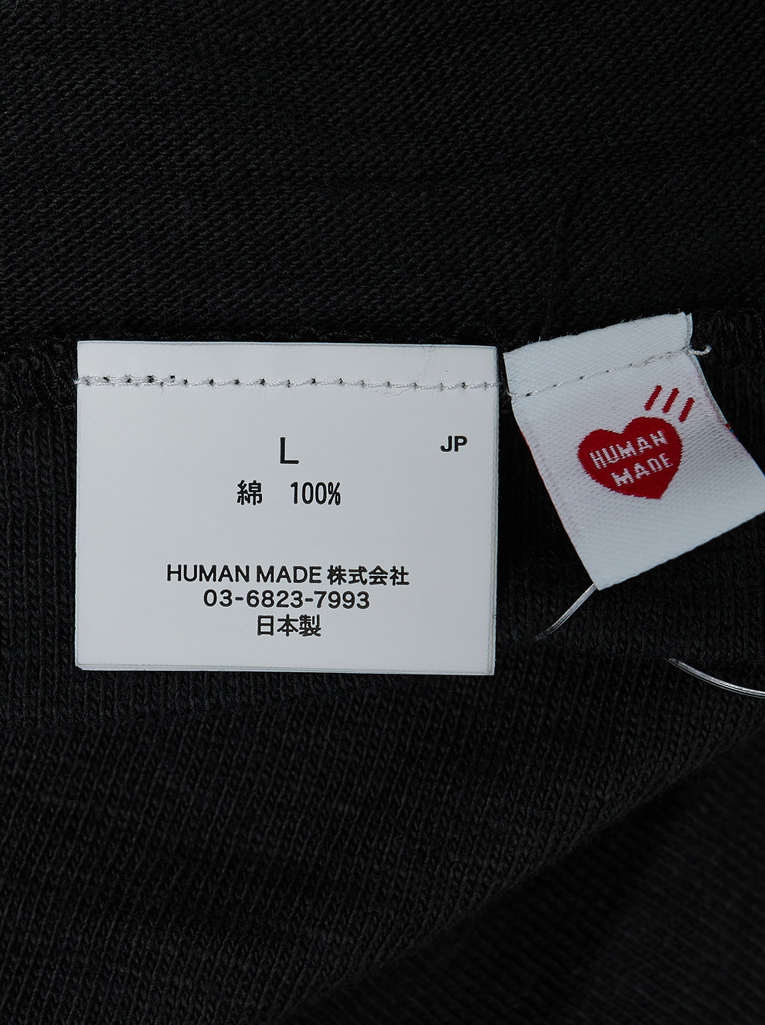 Human Made black short sleeve crew neck t-shirt with a large red hand-drawn heart graphic and 'Human Made' bubble lettering on the chest - view 3
