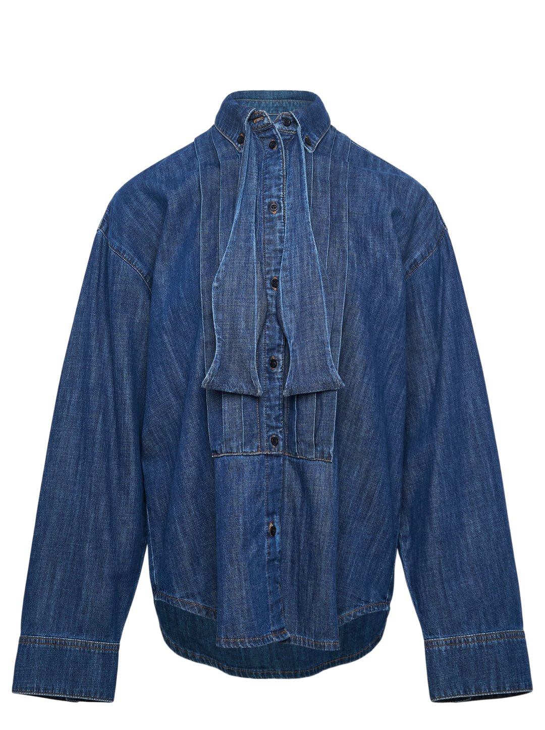 MSGM indigo denim blouse with sculptural attached bowtie bib, button-down collar, full button placket, and wide double cuffs, displayed flat on a white background