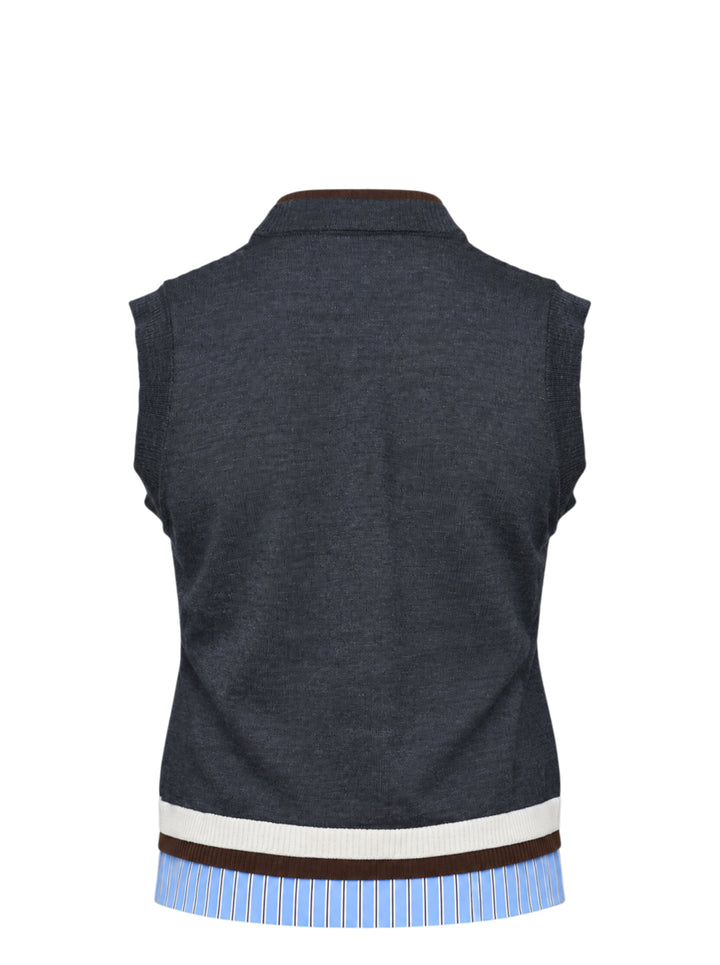 MSGM charcoal grey sleeveless knit vest with dark brown mock neck trim, trompe-l'œil striped shirting hem detail, and embroidered MSGM script logo at the front hem - view 2