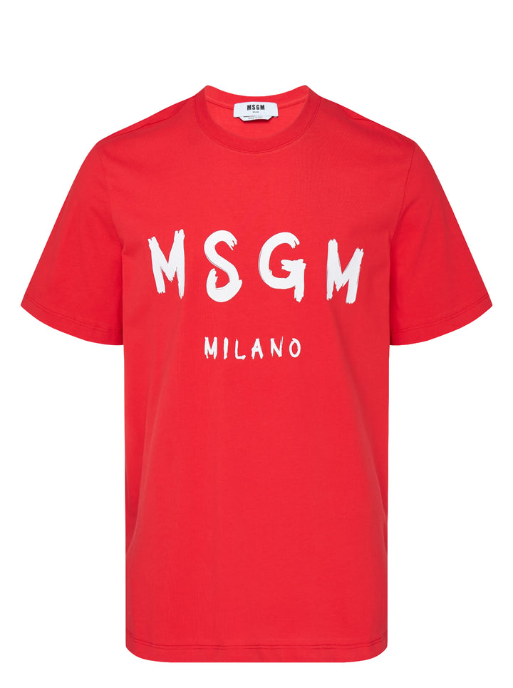 MSGM red cotton short sleeve tee with oversized white brushstroke logo and Milano text printed across the chest