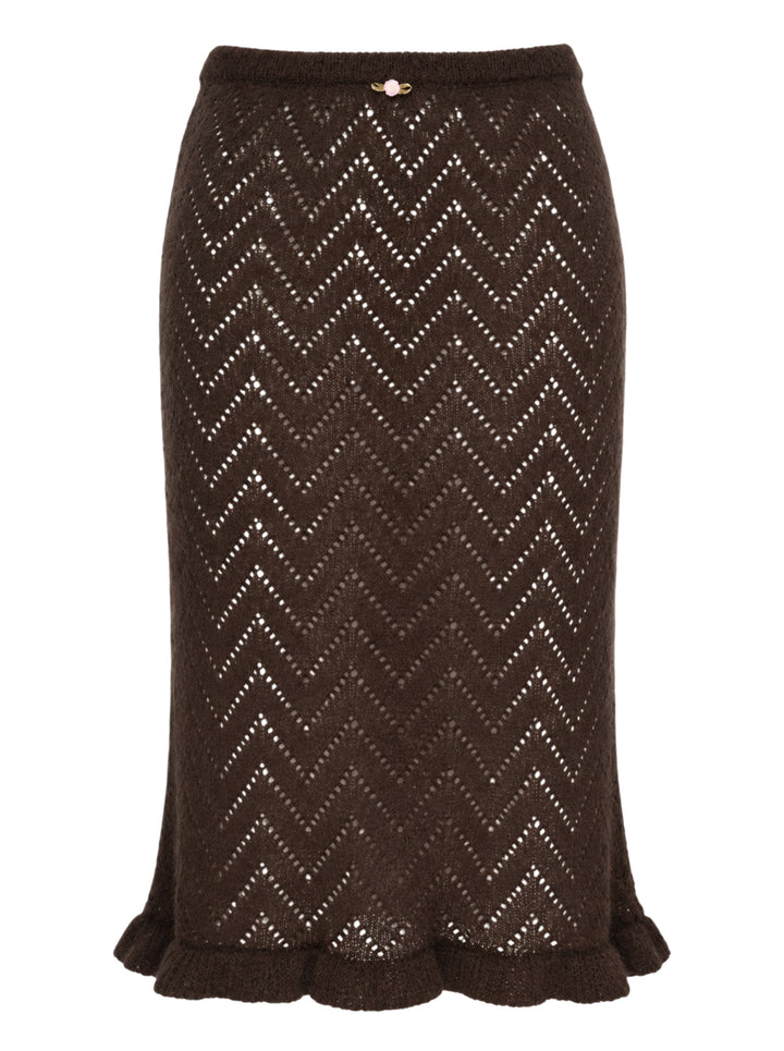 MSGM dark brown chevron pointelle knit midi skirt with ribbed waistband, pearl pin detail, and fluted ruffle hem trim, shown flat on white background