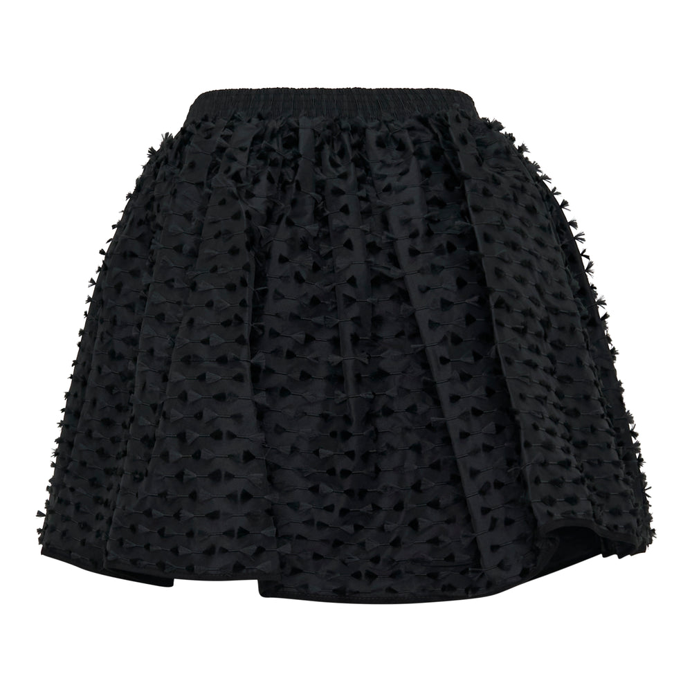 Cecilie Bahnsen Dallas Fiamma fil coupé mini skirt in black with all-over woven bow motif and elasticated waistband, full gathered silhouette on white background