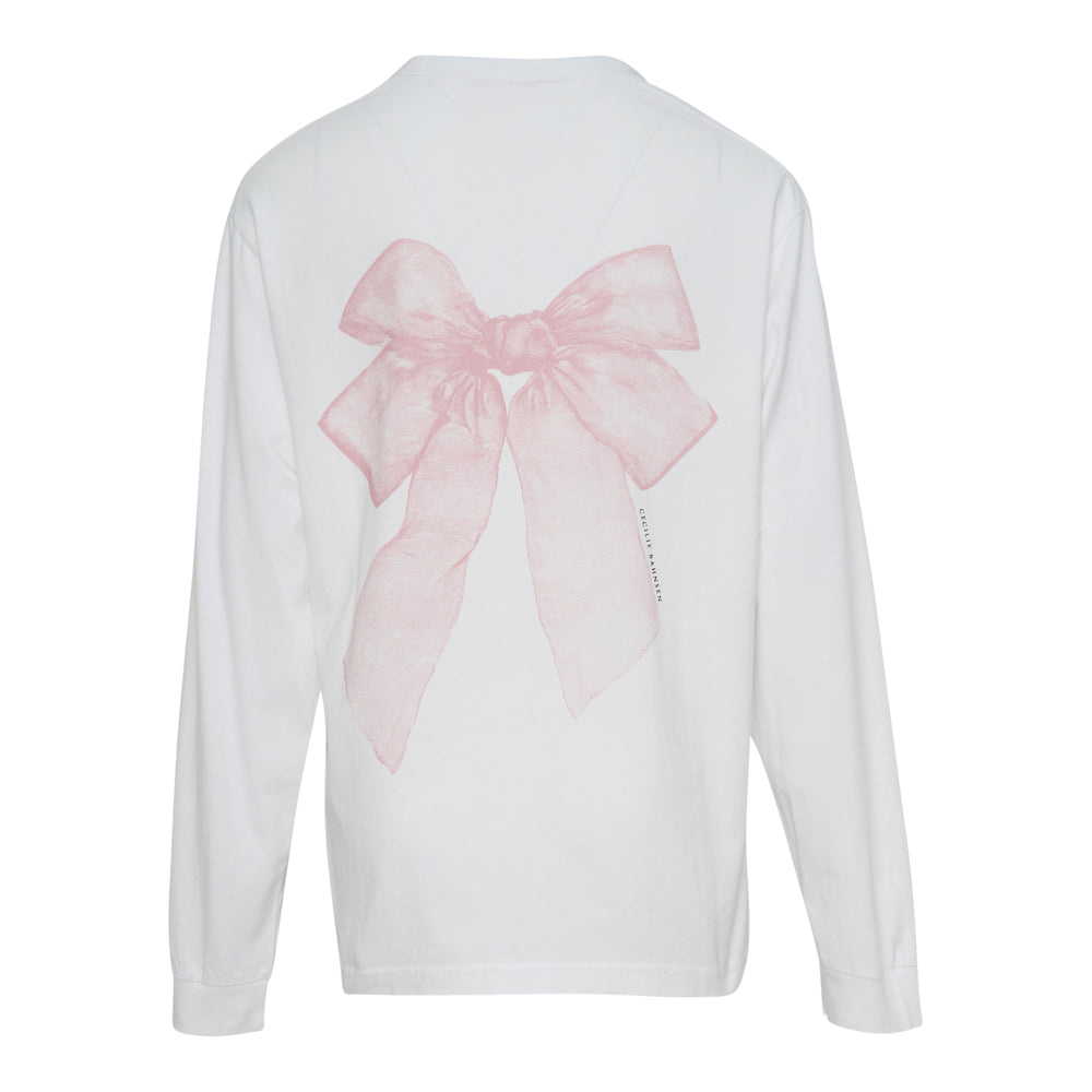 Cecilie Bahnsen Lily Long Sleeve Tee in white, shown from the back, featuring a relaxed oversized silhouette, crew neck, ribbed cuffs, and a subtle tonal logo print on the chest