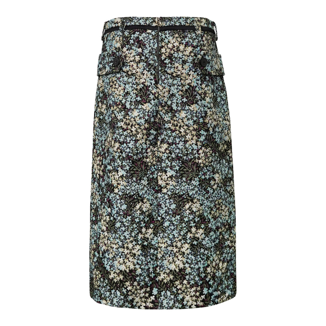 Dries Van Noten floral jacquard straight midi skirt with double-breasted button placket, flap pockets, belt loops with contrast ribbon belt, and front hem pleats, displayed flat on a white background - view 2