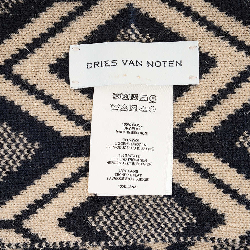Dries Van Noten geometric patchwork knit scarf with ivory and navy diamond lattice upper panel, burnt orange and burgundy tribal stripe lower panel, and navy cord tie detail at the junction - view 2