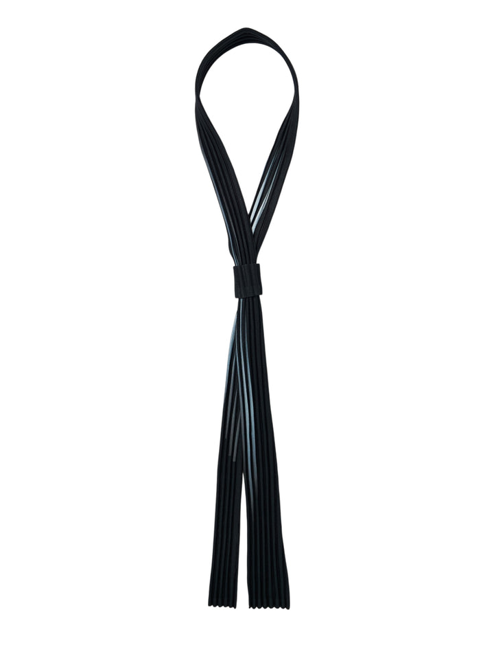Black pleated slim tie by Homme Plissé Issey Miyake with a sliding keeper, shown looped against a white background