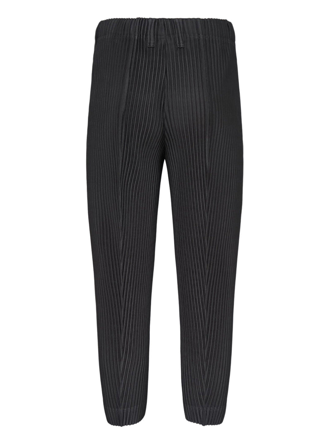 Homme Plissé Issey Miyake Compleat Pleated Trousers in black, shown flat with all-over permanent pleating and elasticated waistband - view 2