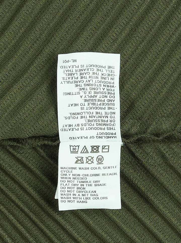 Homme Plissé Issey Miyake Slash Pleated Pants in olive green with signature diagonal micro-pleat construction and elastic waistband, relaxed tapered silhouette - view 3