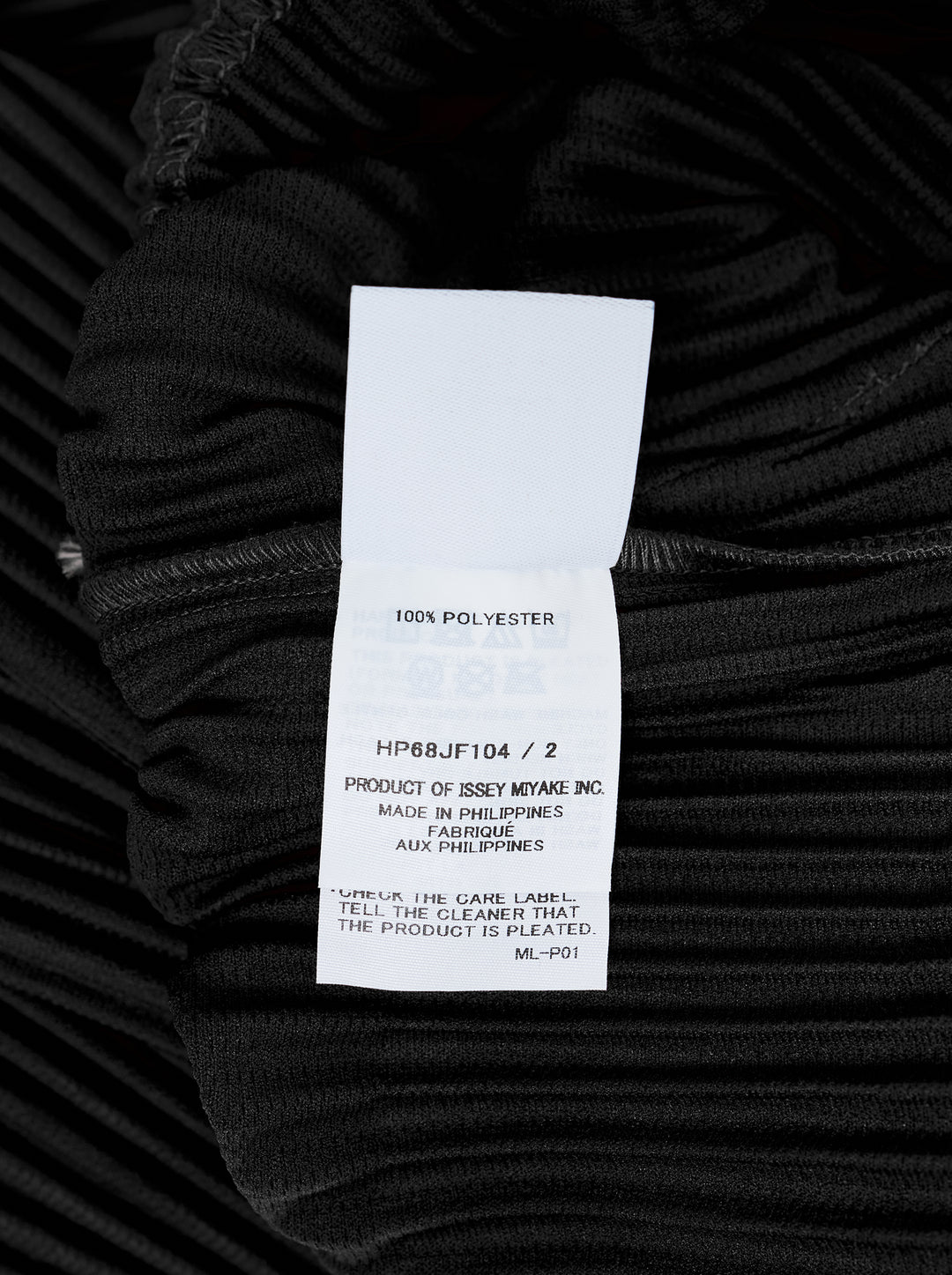 Black long-sleeve pleated button-up shirt by Homme Plissé Issey Miyake from the Monthly Colors October collection, shown from the front - view 3