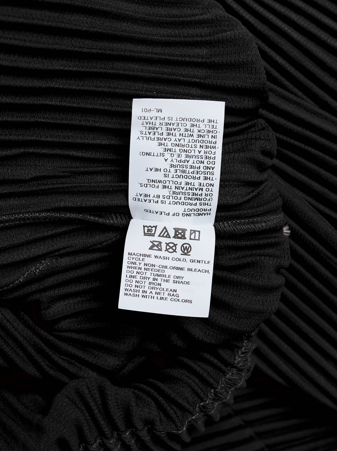 Black long-sleeve pleated button-up shirt by Homme Plissé Issey Miyake from the Monthly Colors October collection, shown from the front - view 4