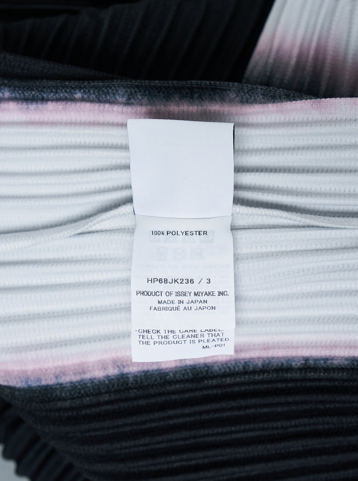 Back view of Homme Plissé Issey Miyake Framework : Chusen pleated short-sleeve top with high funnel neck and blurred black colour-block print edged in white and pink - view 3