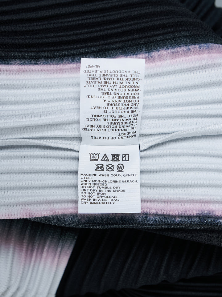 Back view of Homme Plissé Issey Miyake Framework : Chusen pleated short-sleeve top with high funnel neck and blurred black colour-block print edged in white and pink - view 4