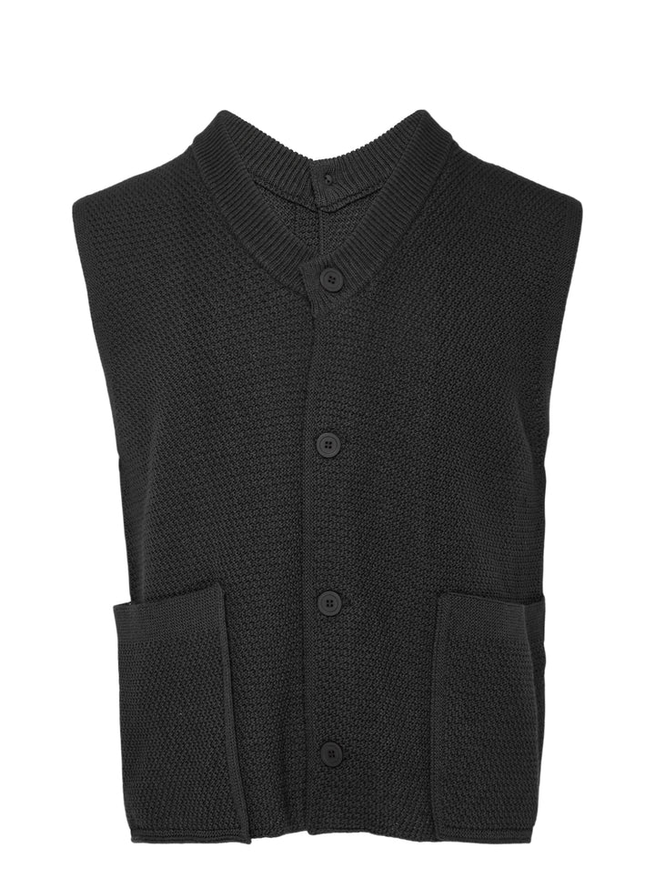 Homme Plissé Issey Miyake Rustic Knit Vest in charcoal, featuring a ribbed stand collar, four-button front closure, and patch hip pockets in a textured moss-stitch fabric