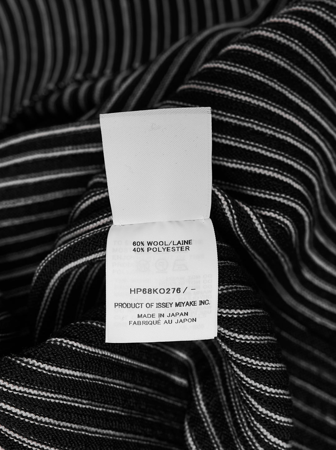 Homme Plissé Issey Miyake In The Shadow Knit sleeveless button-up cardigan in black and white vertical ribbed stripes - view 3
