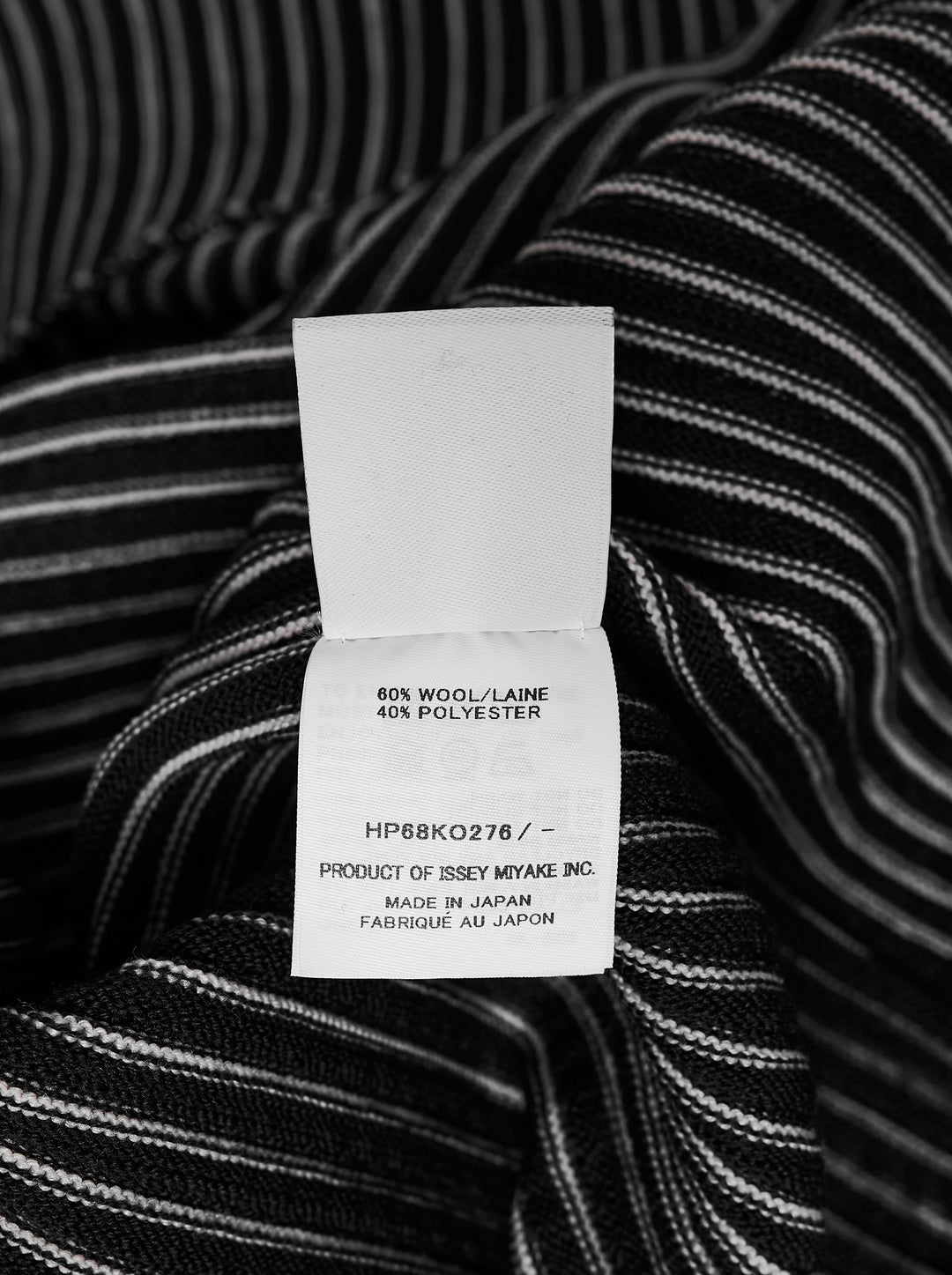 Homme Plissé Issey Miyake In The Shadow Knit cardigan in black with white ribbed lines, button front and rounded sleeves - view 3
