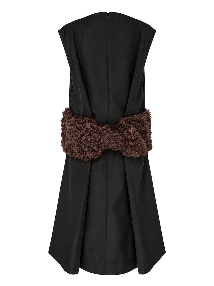 Simone Rocha sleeveless black dress with a boxy peplum silhouette and an oversized brown curled faux fur bow at the waist - view 2