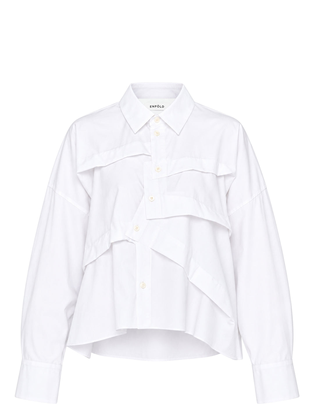Enfold Wide Tucked Ruffle Shirt in white with cascading asymmetric ruffle panels across the front, point collar, and long sleeves with buttoned cuffs