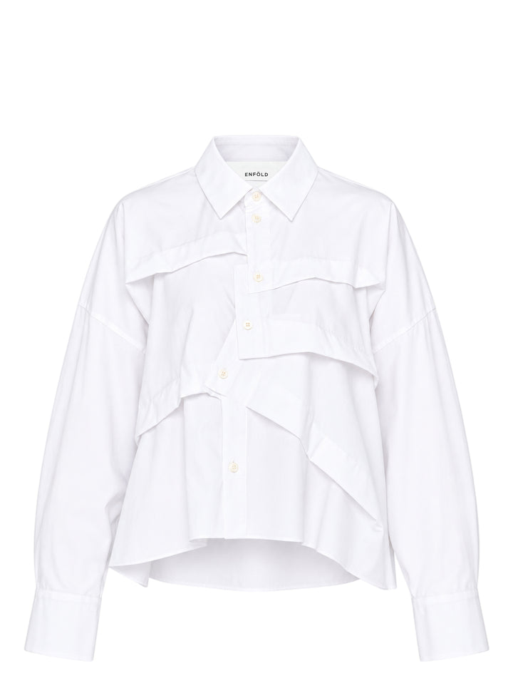 Enfold Wide Tucked Ruffle Shirt in white with cascading asymmetric ruffle panels across the front, point collar, and long sleeves with buttoned cuffs