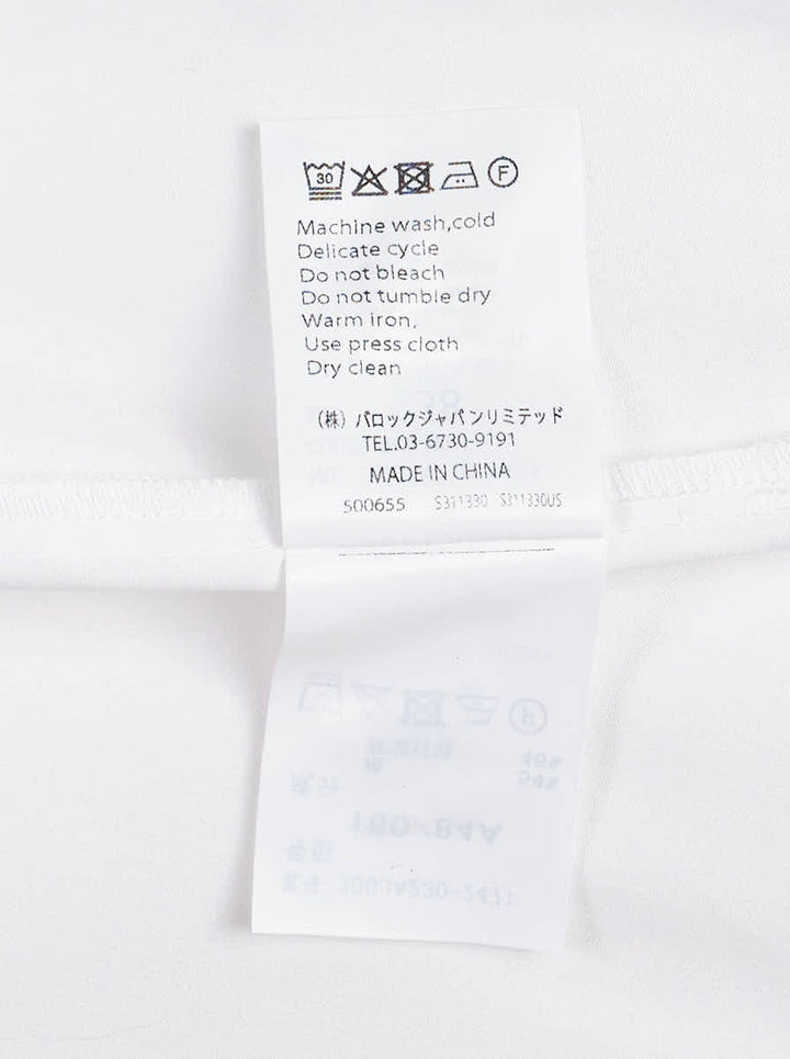 Enfold white oversized hooded button-up shirt with elasticated gathered hood, tonal buttons, long drawstring ties, and a single chest patch pocket - view 3