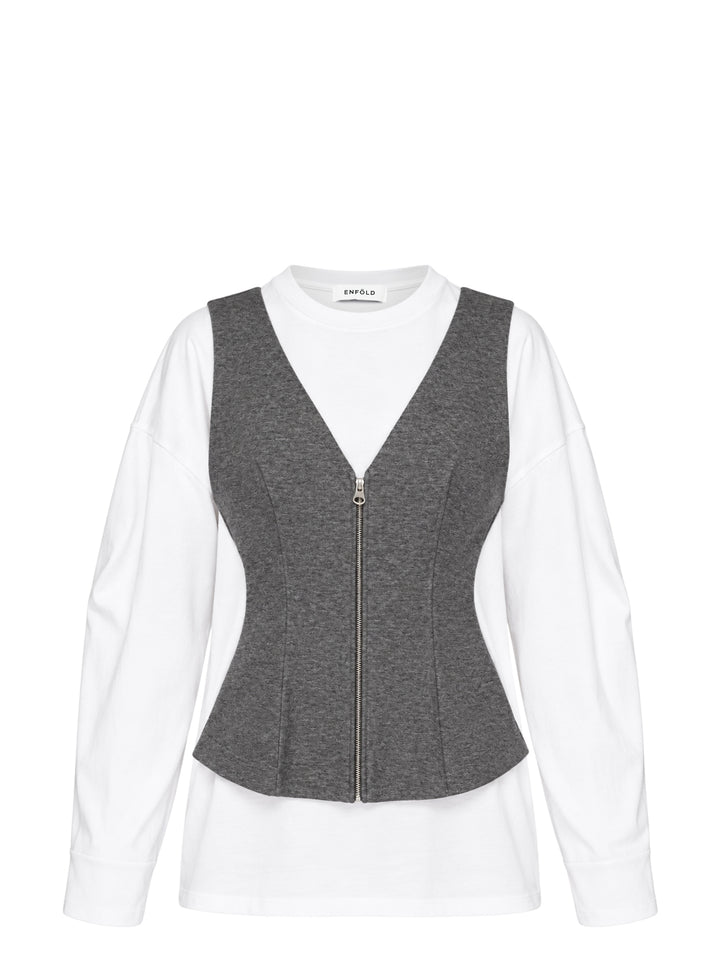 Enfold layered long sleeve tee featuring a white crew-neck underlayer with a structured grey heathered zip-front peplum vest overlay, displayed flat on a white background