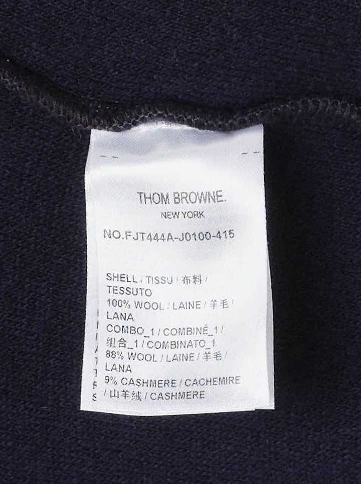 Thom Browne navy wool cardigan jacket with cream ribbed shawl collar, contrast button placket and woven label at the hem - view 3