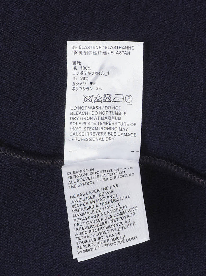 Thom Browne navy wool cardigan jacket with cream ribbed shawl collar, contrast button placket and woven label at the hem - view 4