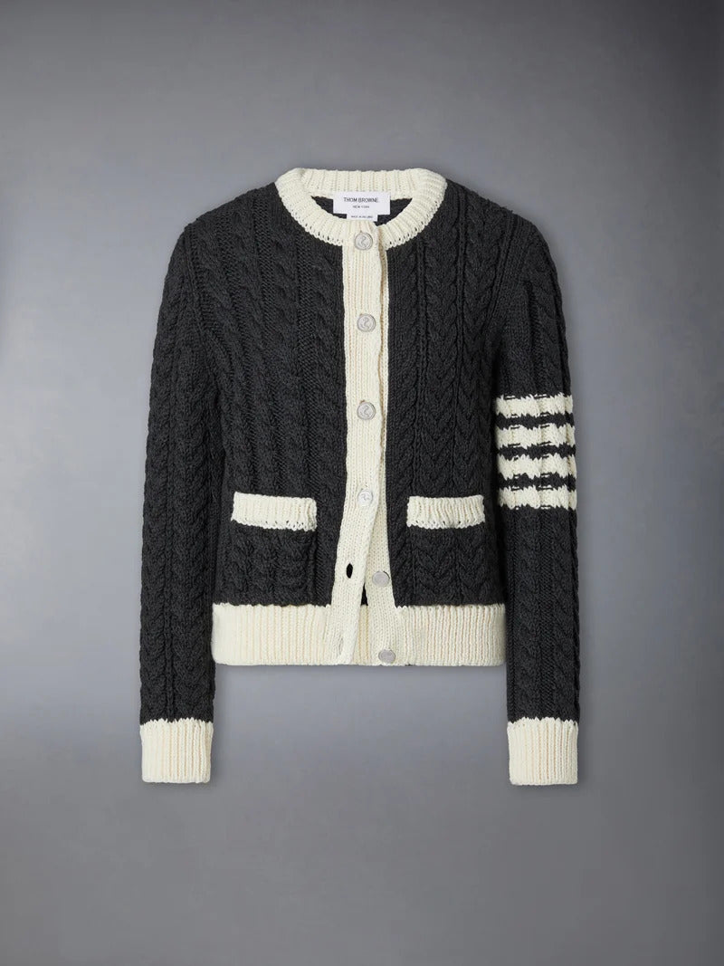 Thom Browne Aran cable-knit crew neck cardigan in charcoal with cream trim, button front, patch pockets and 4-bar stripe on the sleeve