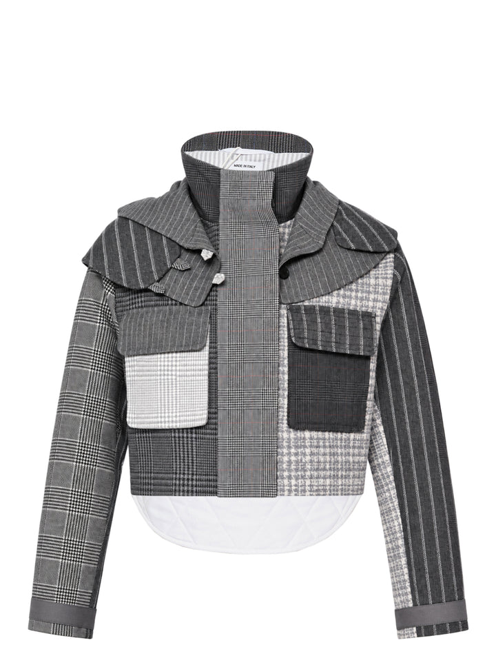 Thom Browne cropped tailored parka in grey patchwork of pinstripe, glen check and houndstooth with layered collar, flap chest pockets and quilted white curved hem