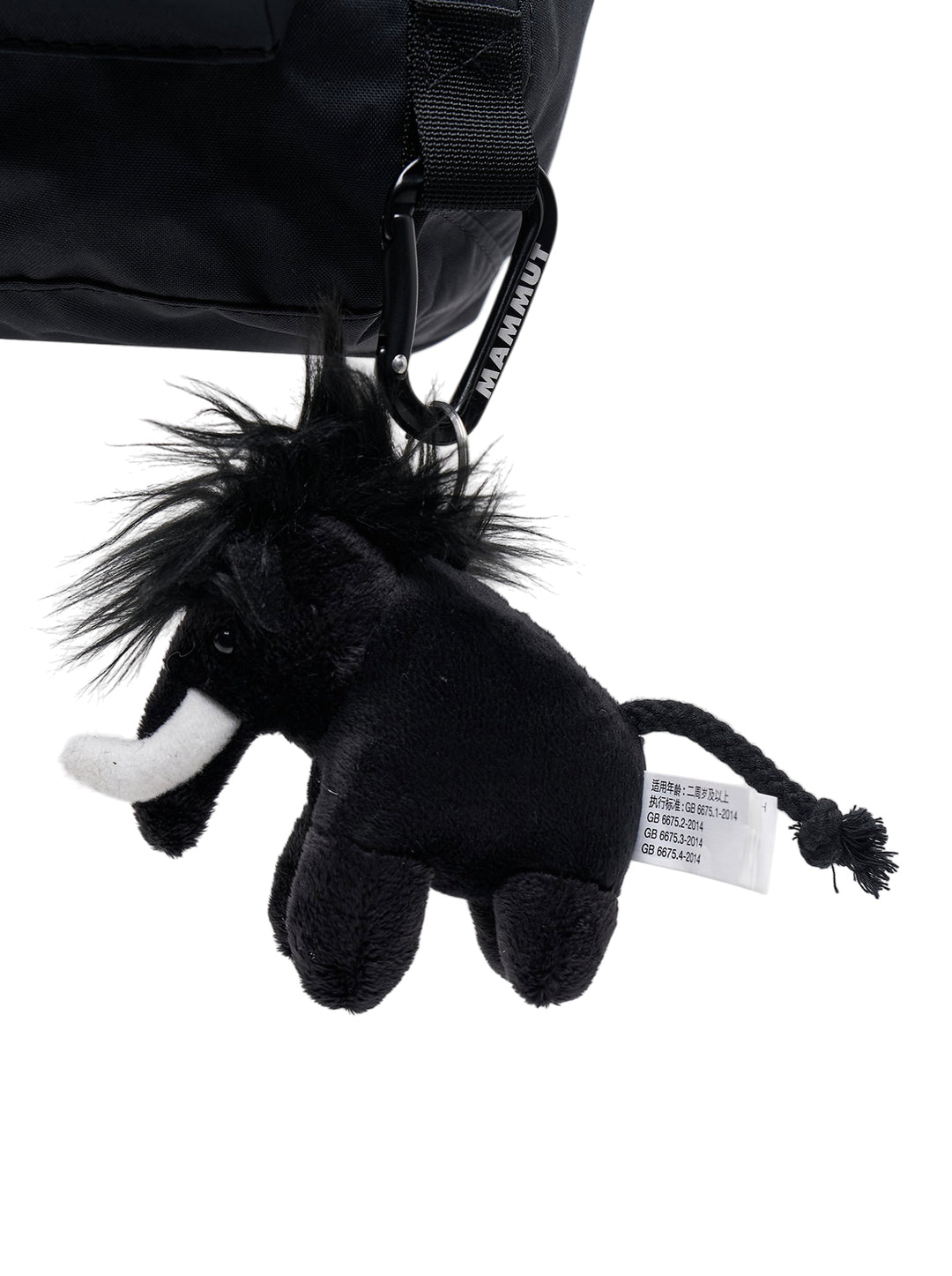 Junya Watanabe x Mammut black backpack with front zip pocket and a plush black mammoth charm clipped to the base - view 6