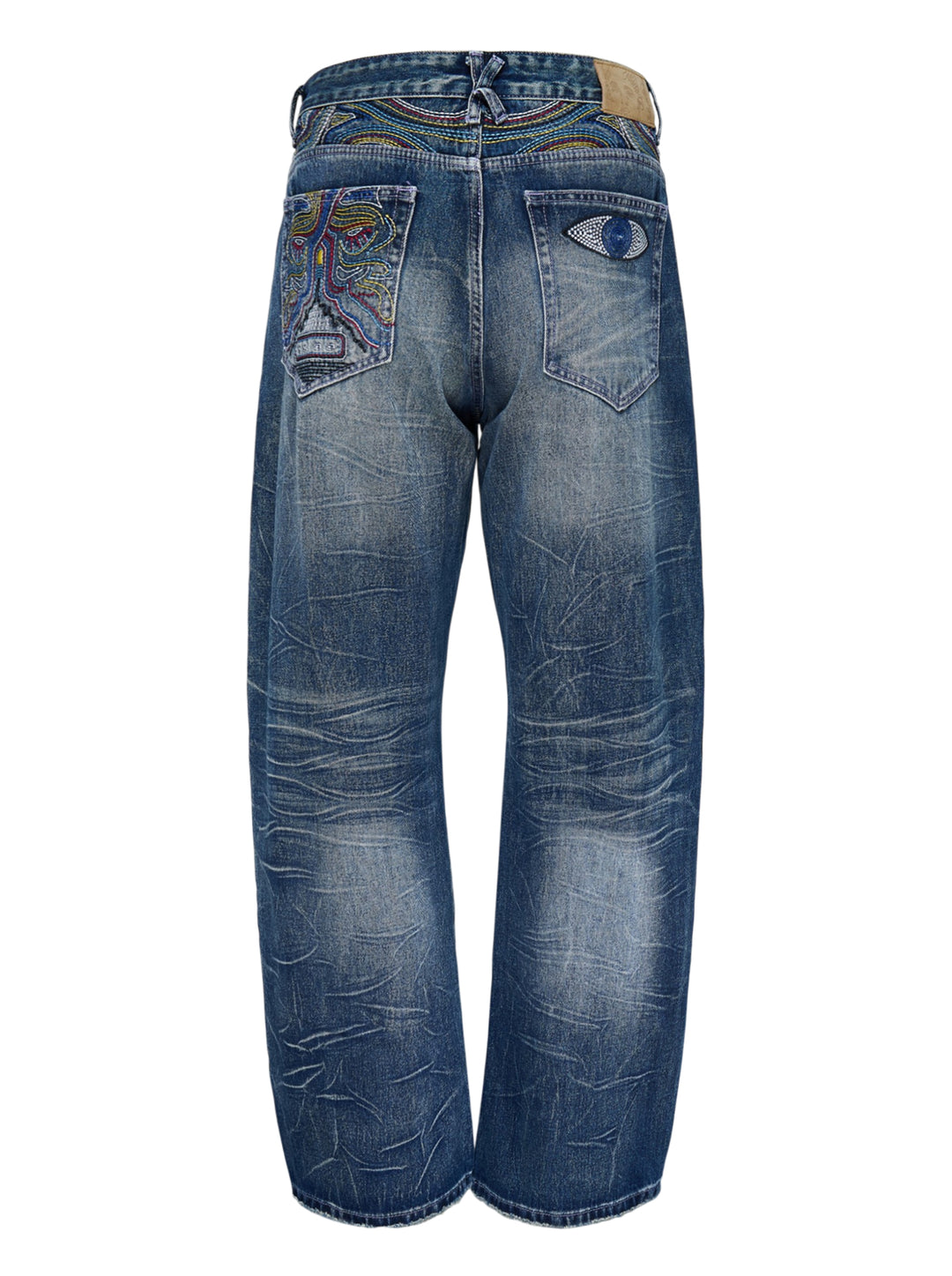 KidSuper Studios Gemstone Eye Embroidery Jeans in faded indigo denim with beaded eye embroidery along both outer legs, shown from the front - view 2