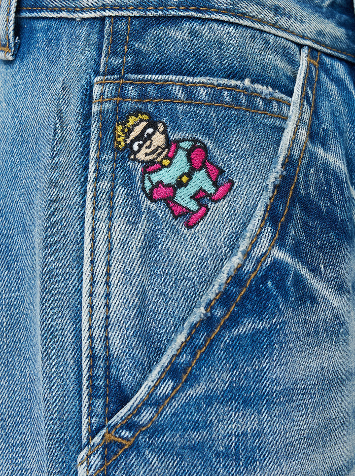 KidSuper Studios Eye Badge washed double knee jeans in faded blue denim with contrast topstitching and utility hammer loop, front view - view 4