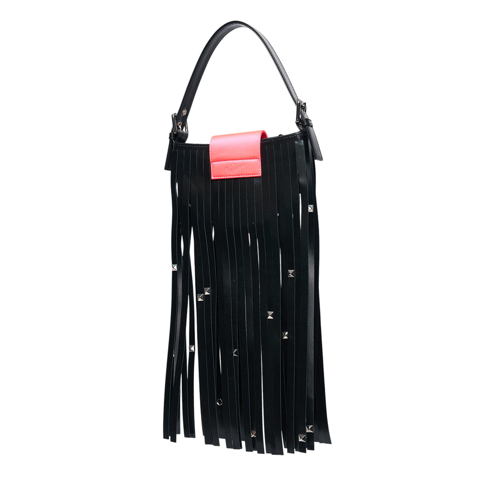 Vaquera Mini Fringe Leather Top Handle Bag in black with cascading studded leather fringe and neon coral buckle closure on a white background