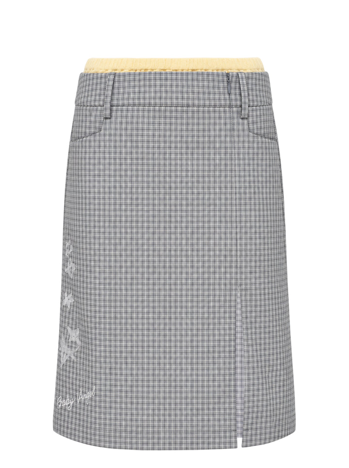 Sultry Virgin Freshman Deconstructed Gingham Skirt in grey check with yellow knit waistband, star embroidery, and 'Baby Angel' script detail on a white background