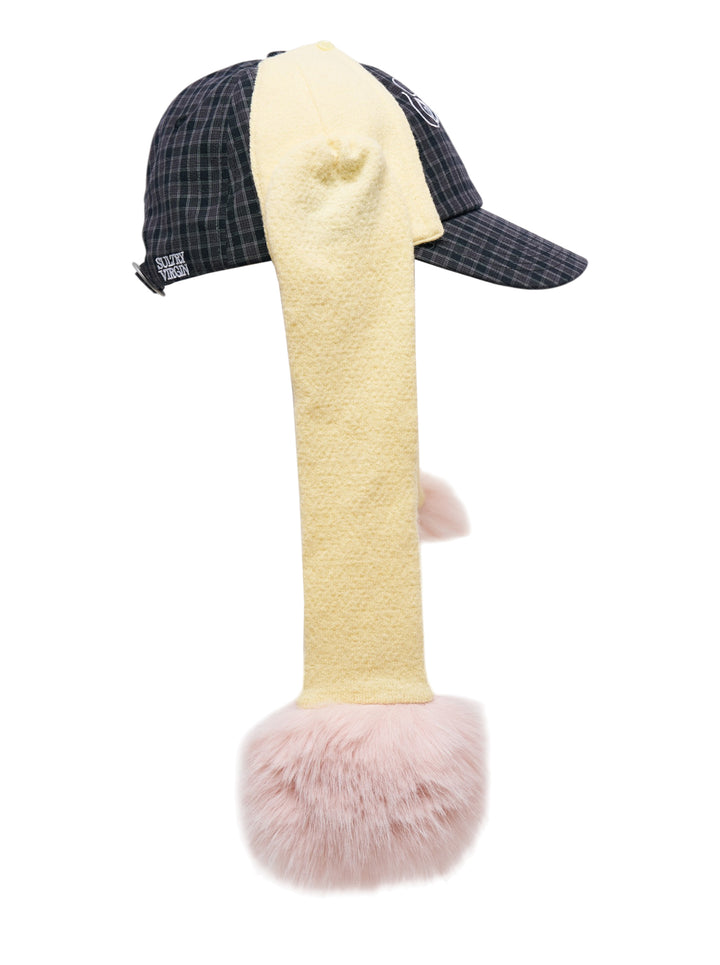 Sultry Virgin Alumni Cardigan Cap in dark plaid with cream fleece drop-ear panels and oversized blush faux-fur pom-poms, featuring embroidered SV lettering on the front - view 3