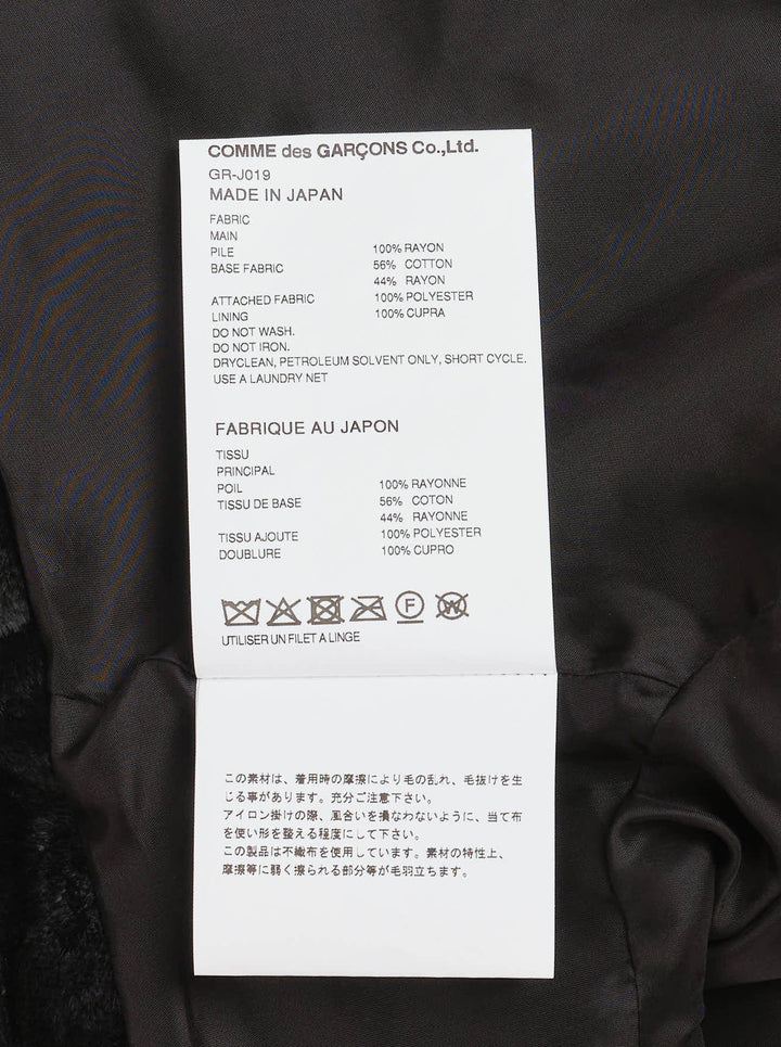 Comme des Garçons cropped asymmetric blazer in black faux fur with contrast collar and flap details - view 3