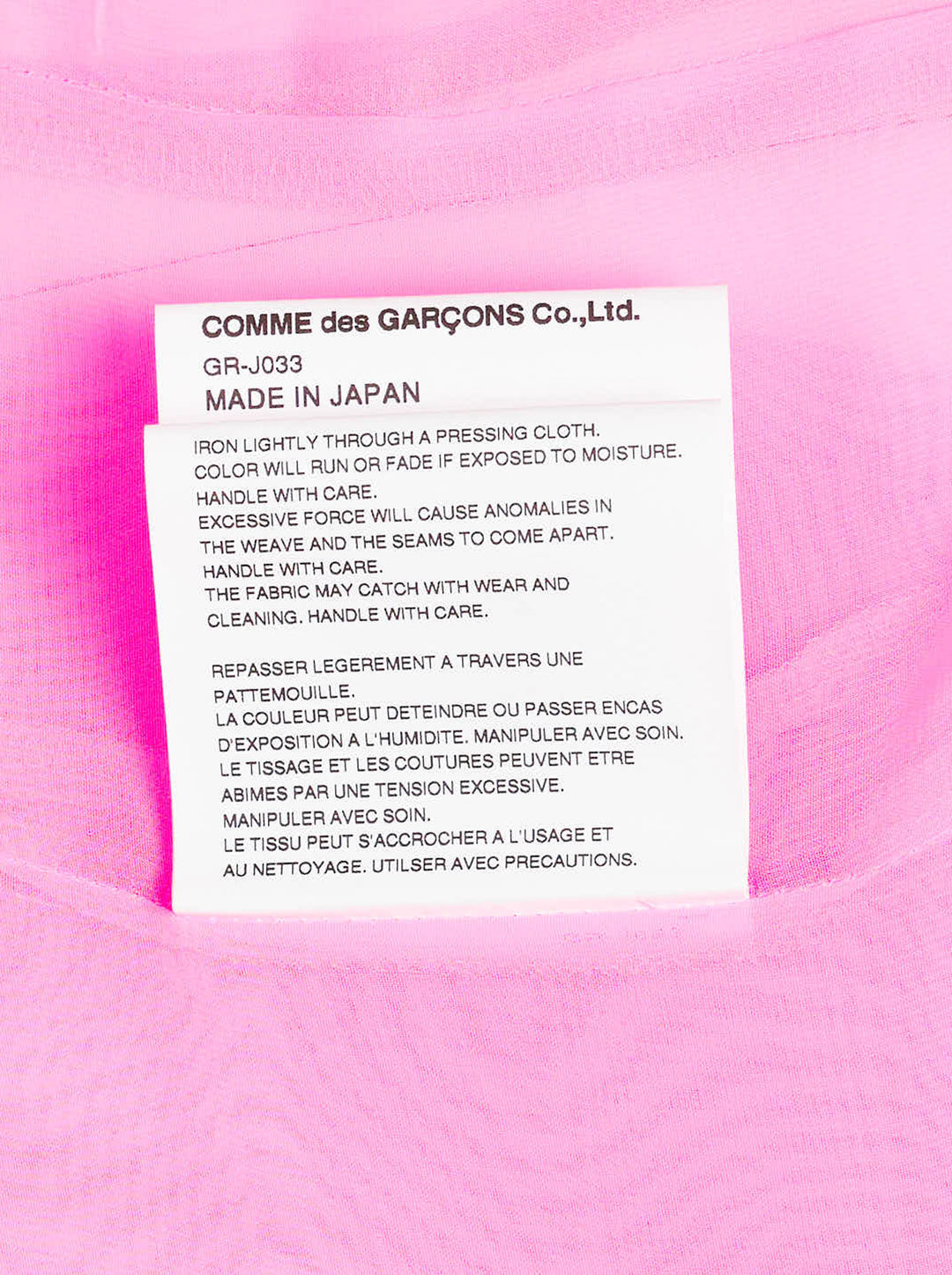 Comme des Garçons pink sheer tailcoat blazer with notched lapels, two-button fastening, chest welt pocket, and dramatic swallow-tail hi-lo hem - view 4