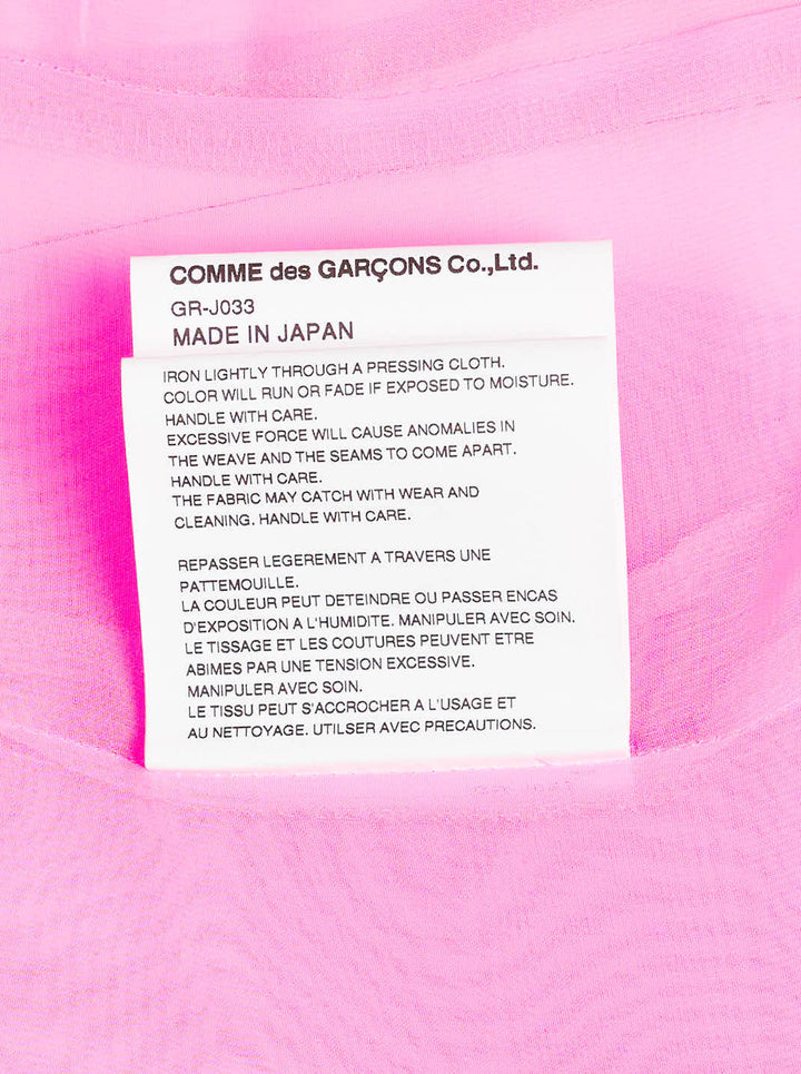 Comme des Garçons pink sheer tailcoat blazer with notched lapels, two-button fastening, chest welt pocket, and dramatic swallow-tail hi-lo hem - view 4